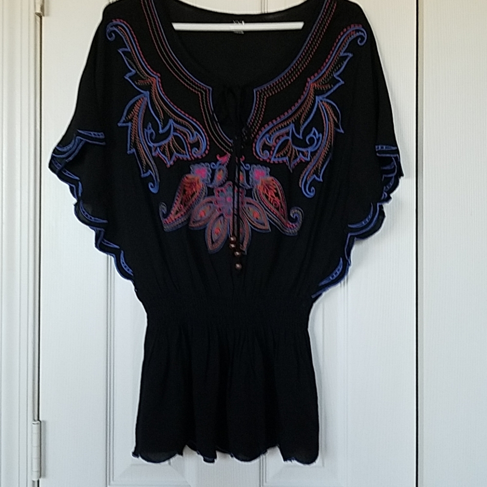 Black top with embroidery and elastic waistband